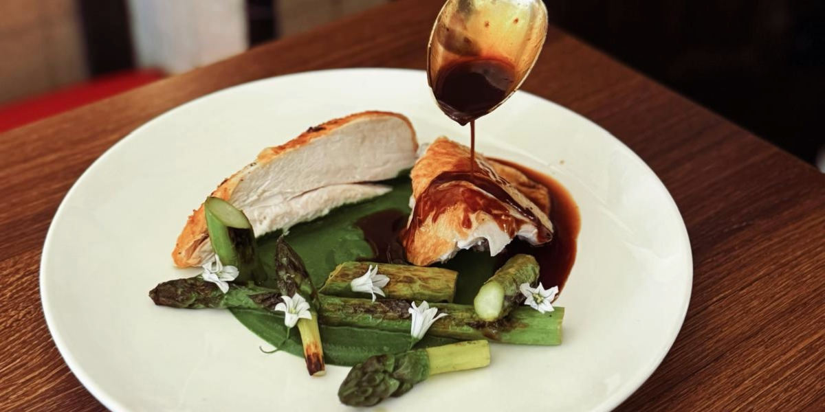 Roast chicken and asparagus dish.