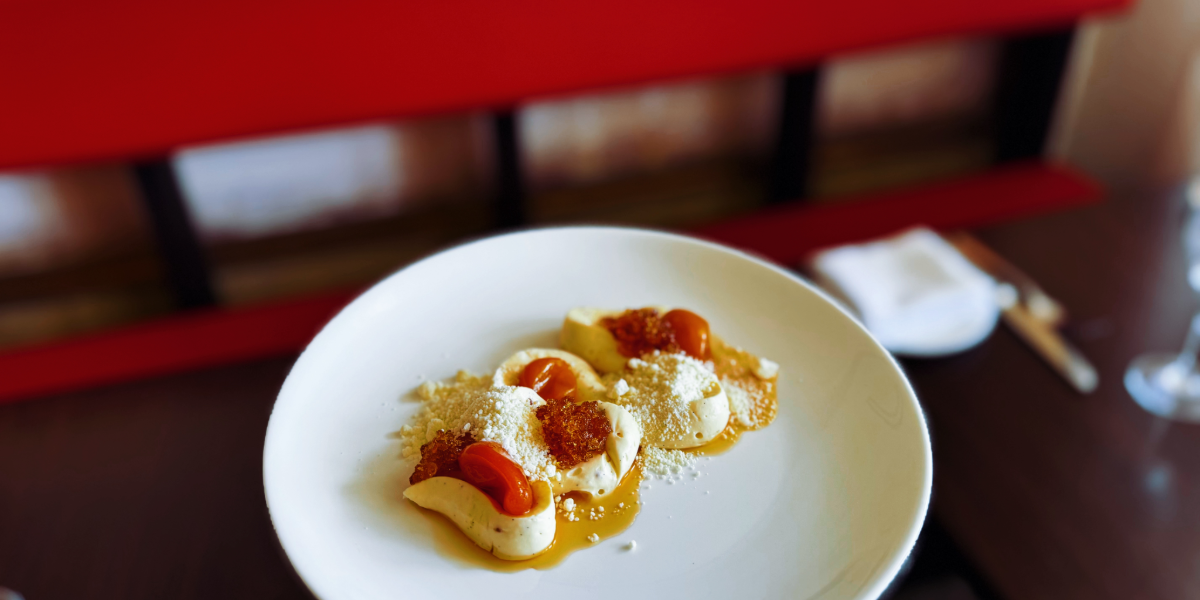 Whipped vanilla cheesecake with candied cumquats and white chocolate crumb