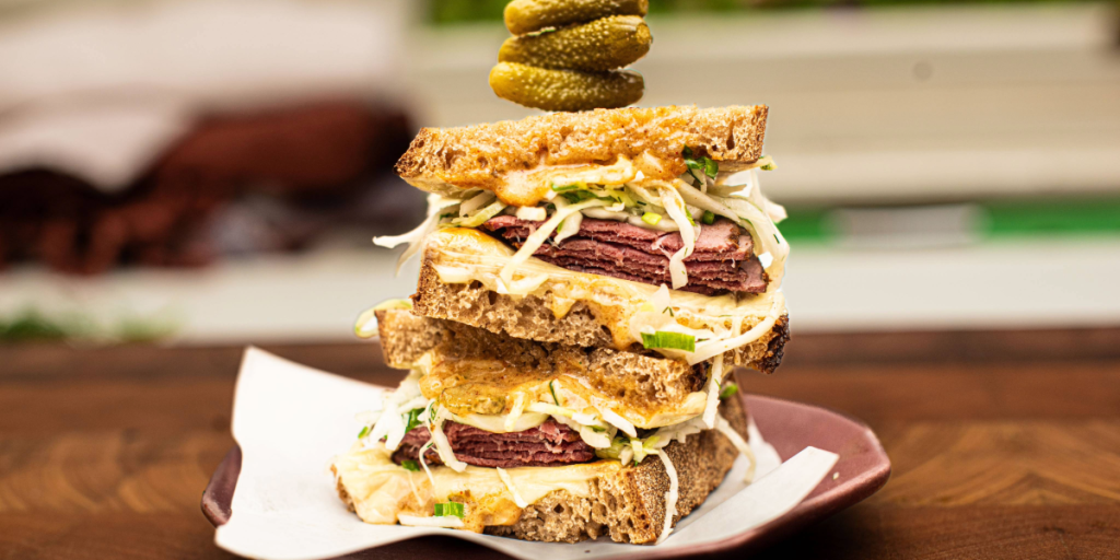 Reuben sandwich on a plate.